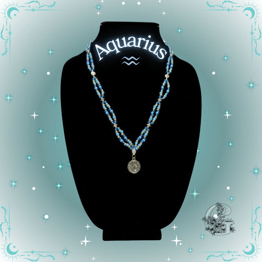 Aquarius Zodiac Necklace – handcrafted beaded necklace in aqua-blue tones featuring the Aquarius symbol, representing originality and inspiration.