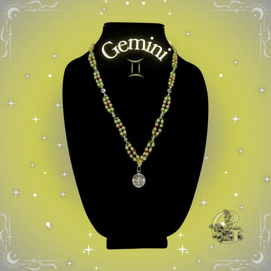 Gemini Zodiac Necklace – handcrafted beaded necklace in yellow tones with the Gemini symbol, representing duality and adaptability.