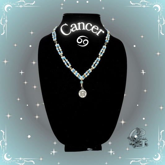Cancer Zodiac Necklace – handcrafted beaded necklace in silver-gray tones featuring the Cancer symbol, symbolizing intuition and emotional depth.