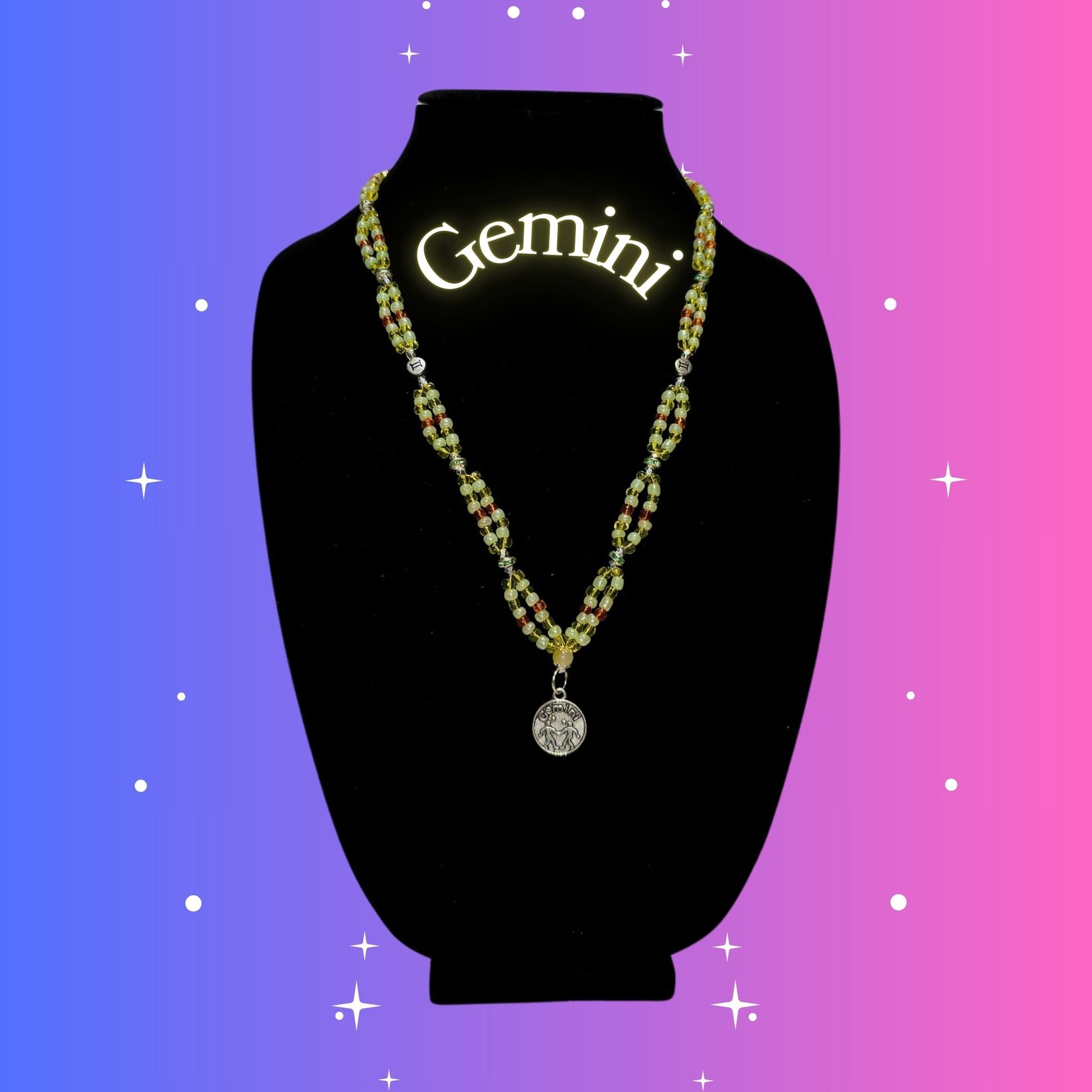 Gemini Zodiac Necklace – handmade yellow, green, and orange beaded necklace with silver-tone Gemini pendant, crafted by Gitana Mystical Products.