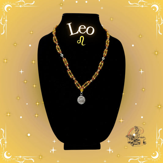 Leo Zodiac Necklace – handcrafted beaded necklace in golden hues with the Leo symbol, representing passion, confidence, and warmth.