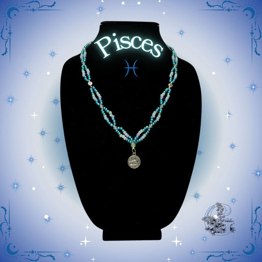 Pisces Zodiac Necklace – handcrafted beaded necklace in ocean-blue tones with the Pisces symbol, representing calm energy and imagination.
