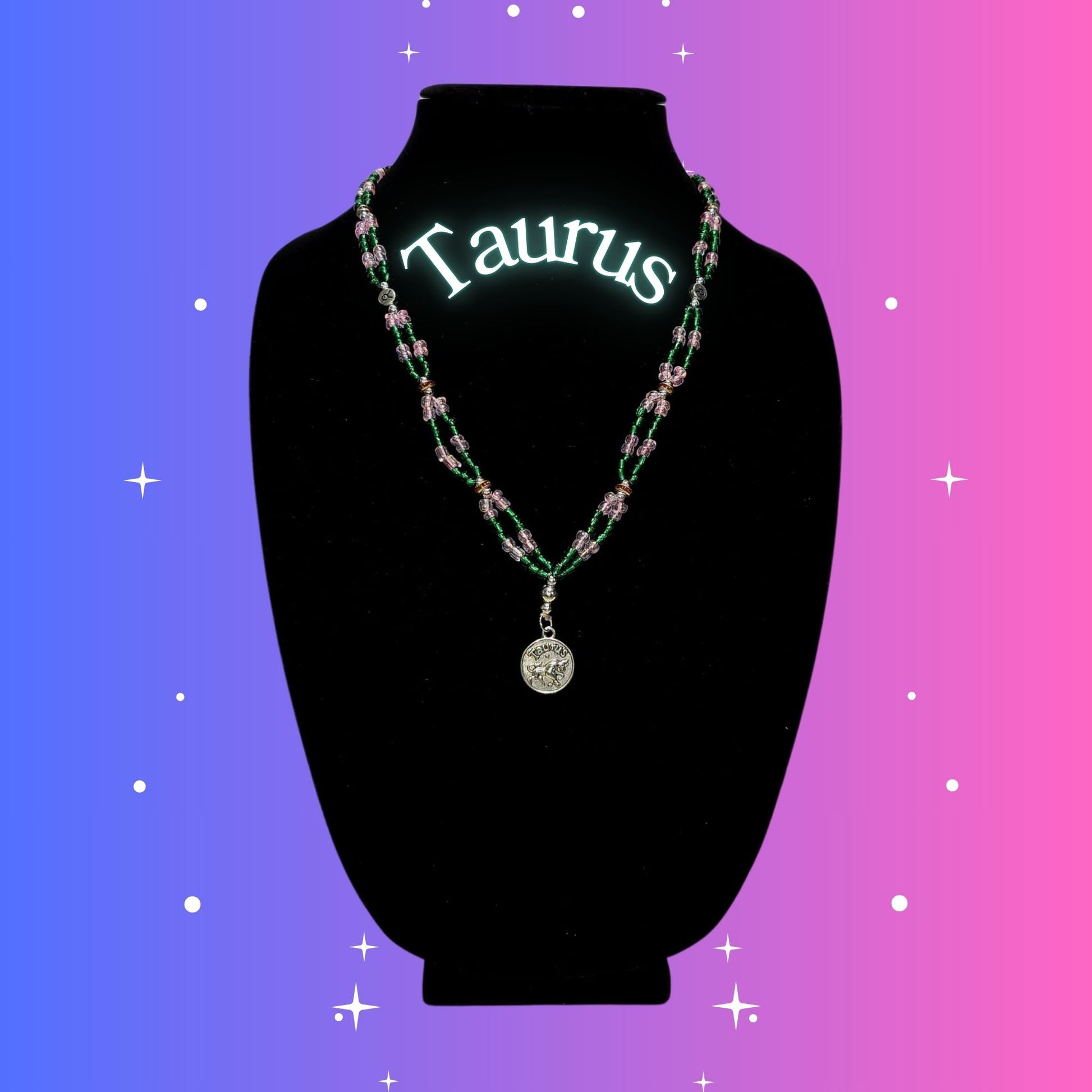 Taurus Zodiac Necklace – handmade green, gold, and pink beaded necklace with silver-tone Taurus pendant, crafted by Gitana Mystical Products.